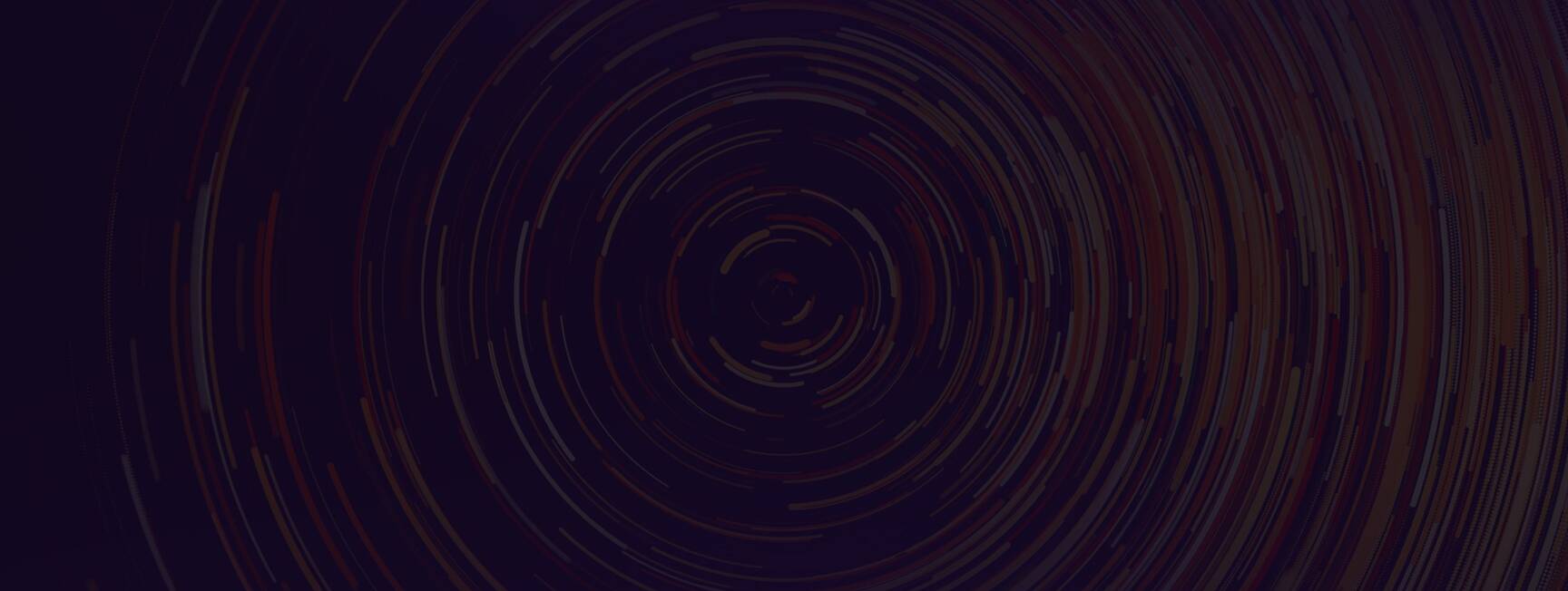 A dark background with a spiral pattern
